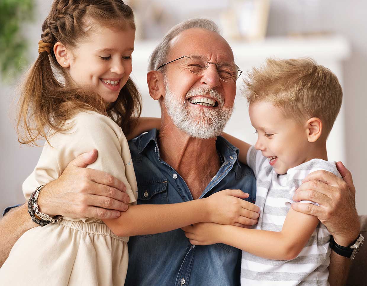 Grandfather with grandkids laughing image