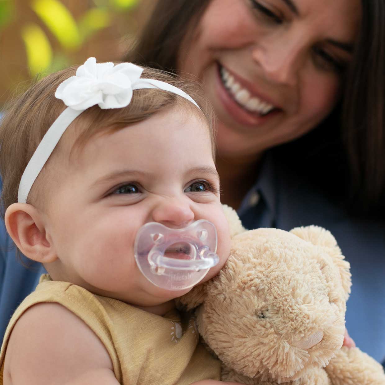 Baby with Chicco pacifier image