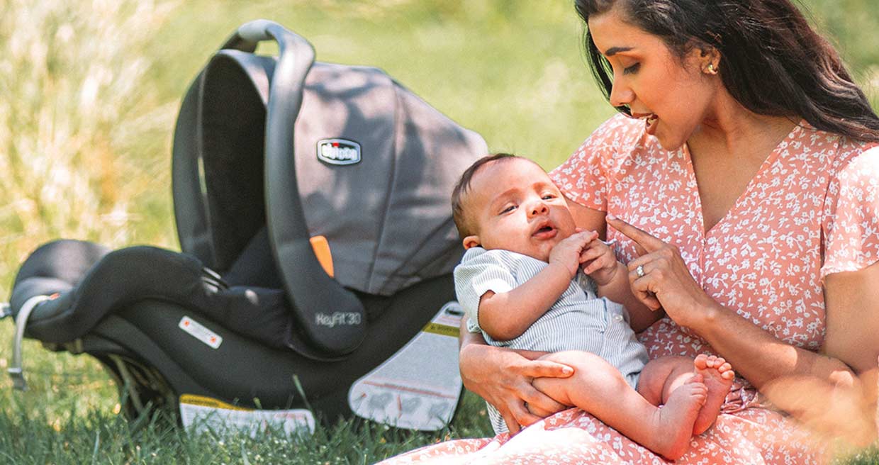 Mother with a Baby in a Chicco ClearTex infant car seat made with non-toxic, flame-retardant-free materials