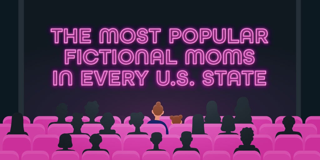 People sitting in a theater viewing a screen