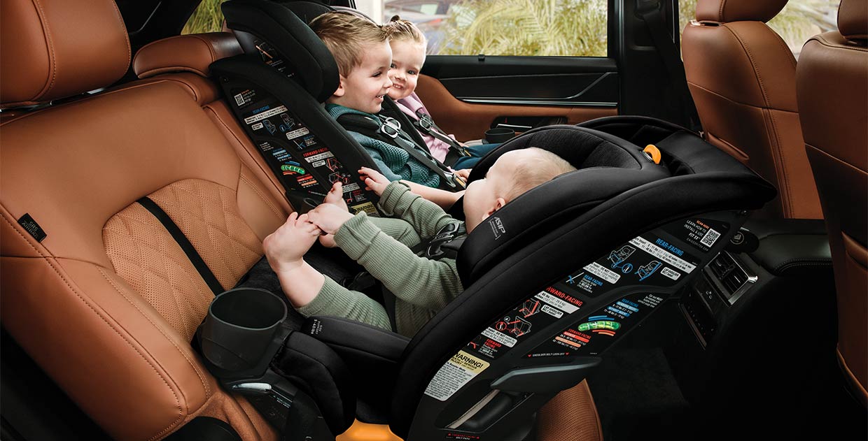 Chicco Fit3x Car Seats sitting 3 across image